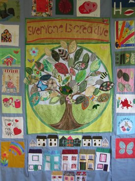 Photograph of Everyone Is Creative wall hanging made by Cwm Crafty Group